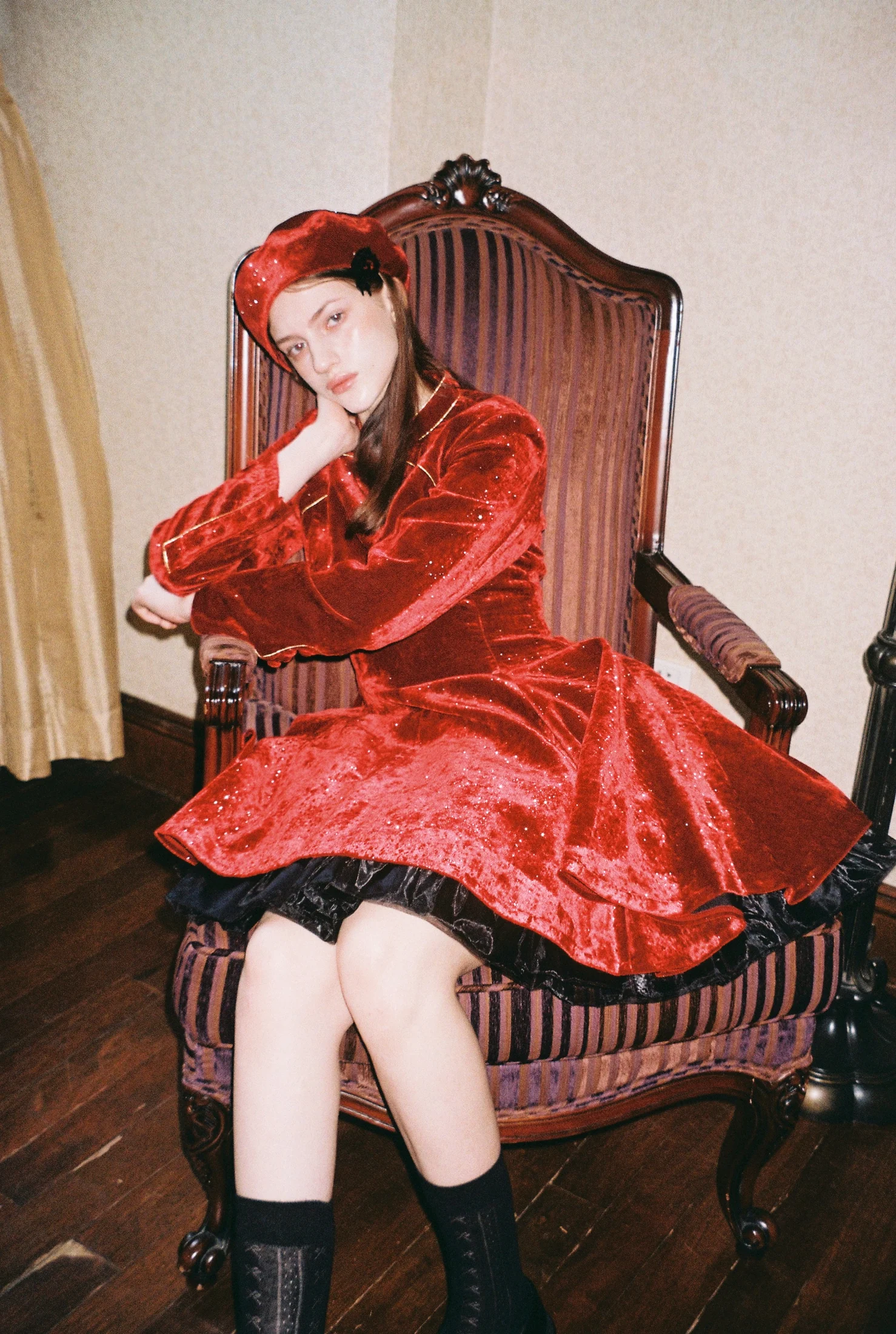 Red velvet dress in a chair
