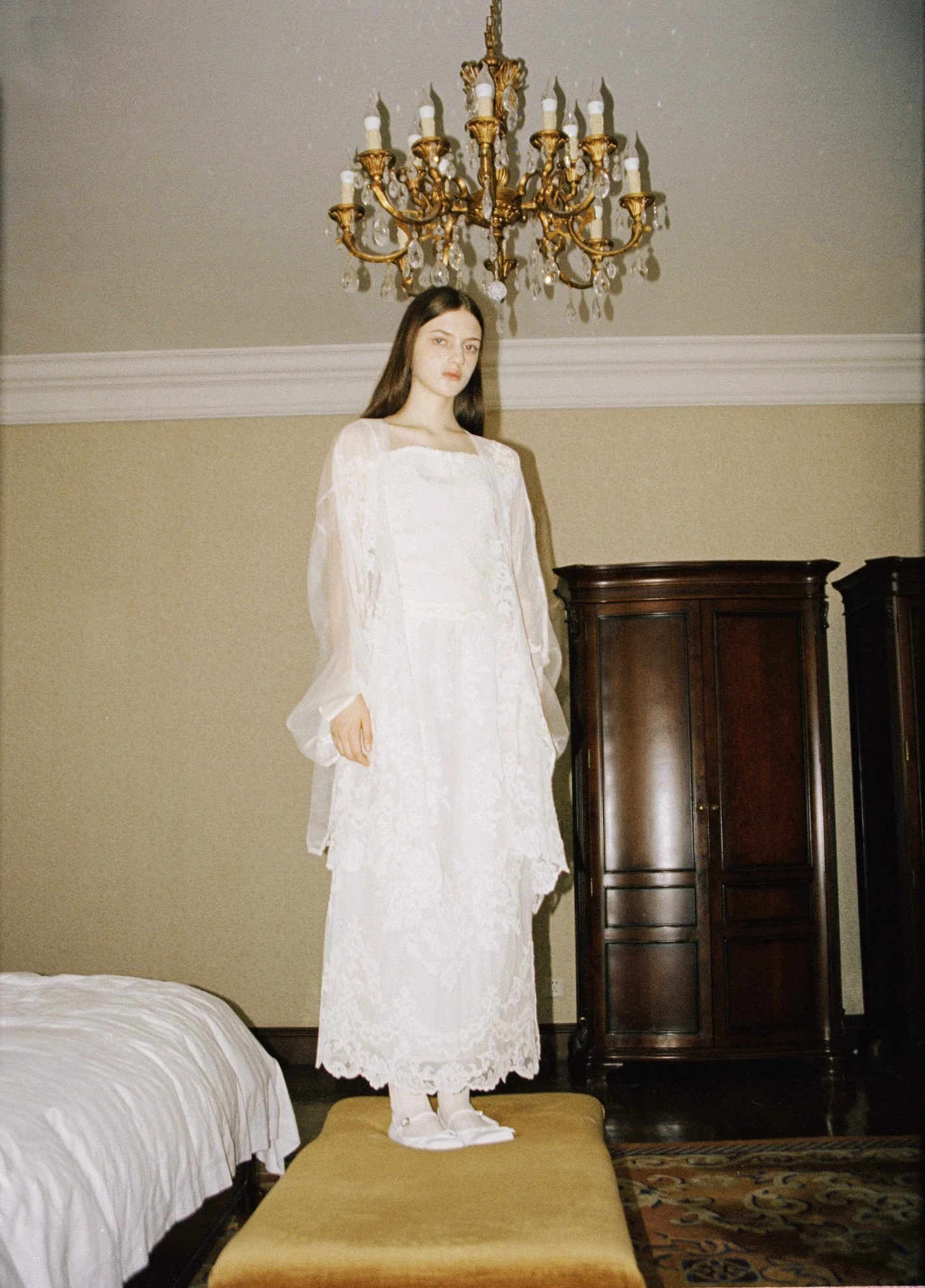 White lace dress in a room